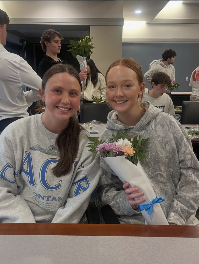 Participants holding flowers