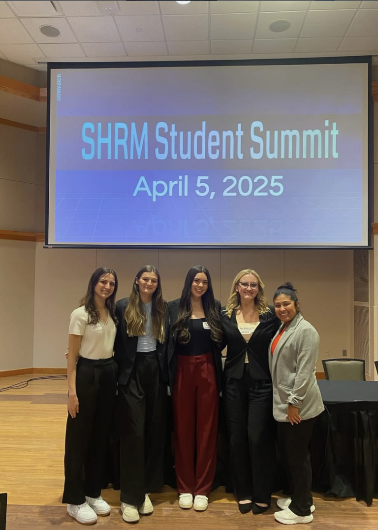 Participants at an event with a presentation
